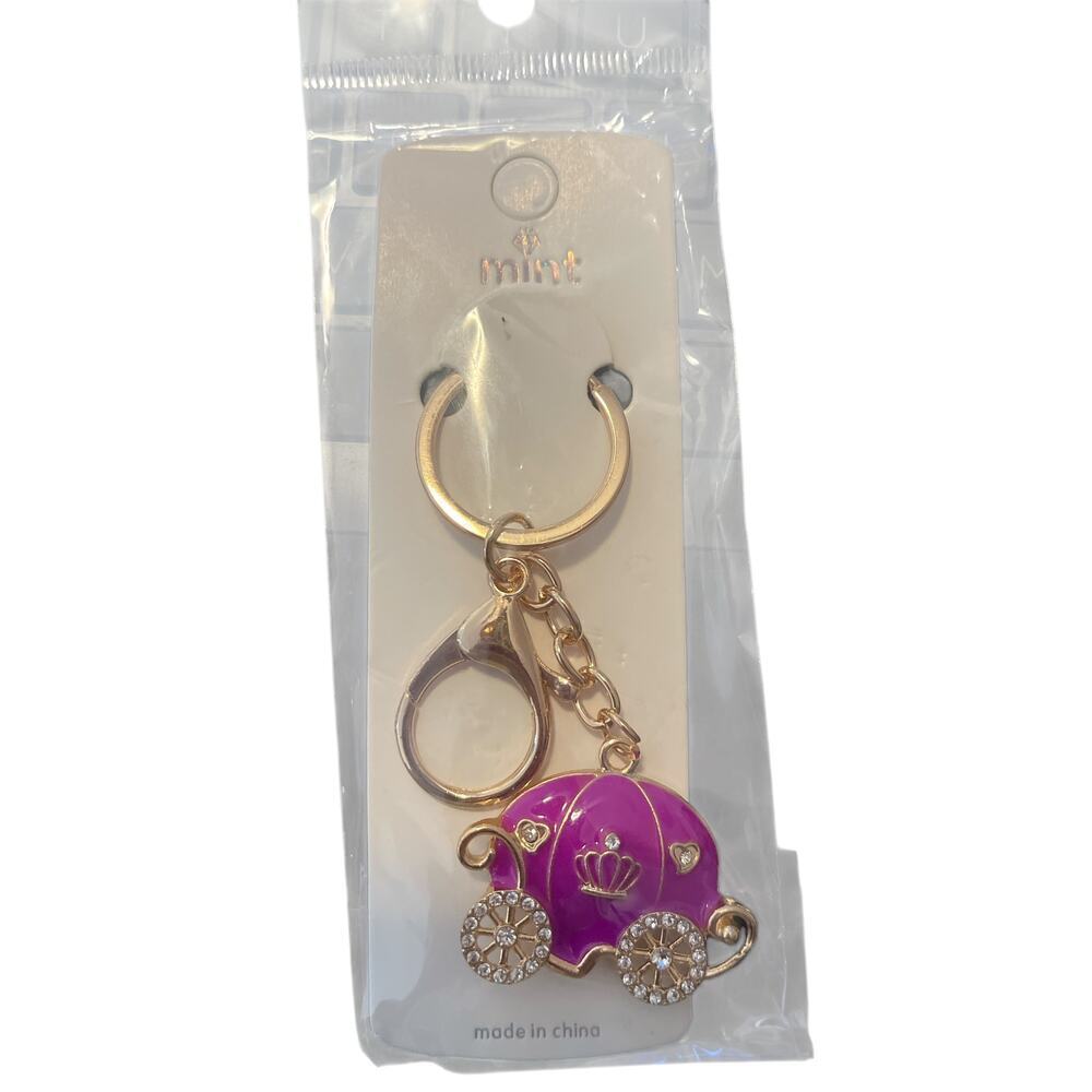 MINT RED CARRIAGE IS ON GOLD PLATED KEY CHAIN